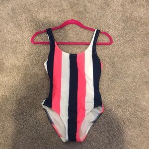 One piece solid and striped bathing suit